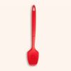 Brosse universelle en silicone rouge